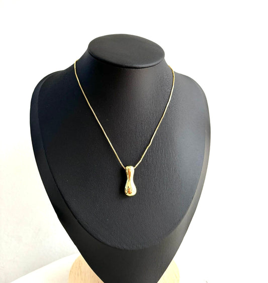 Golden necklace with letter I